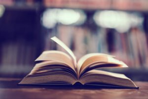 Book in library with open textbook,education learning concept